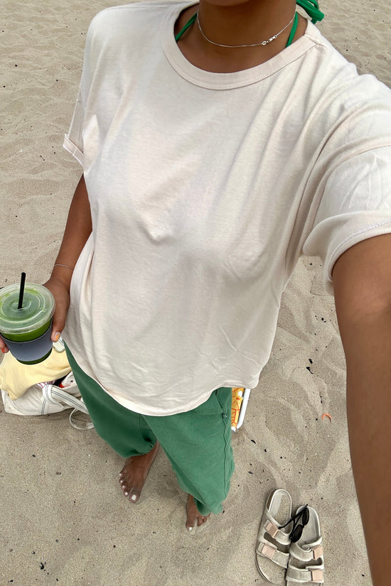Her Tee