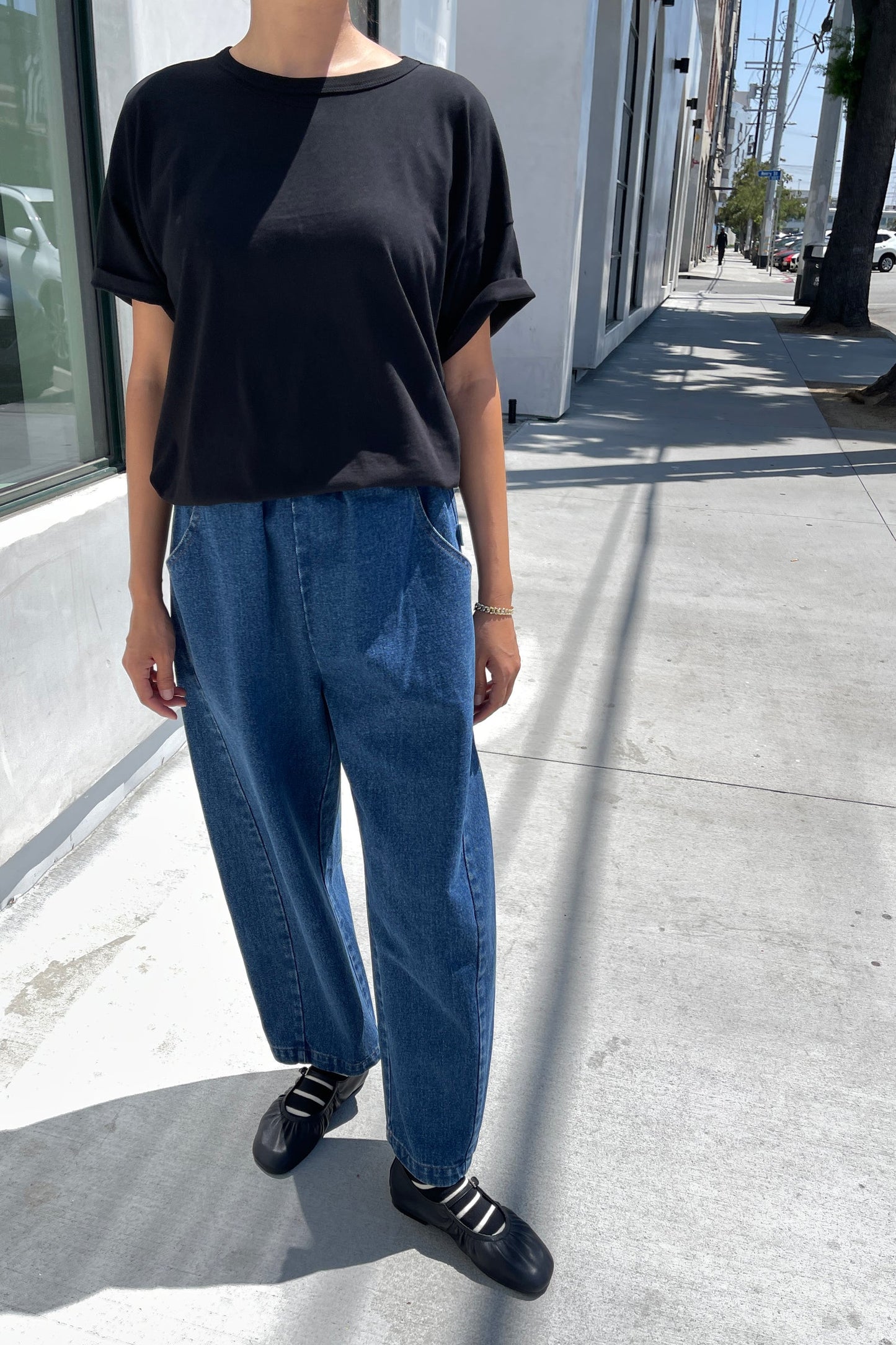 Her Tee