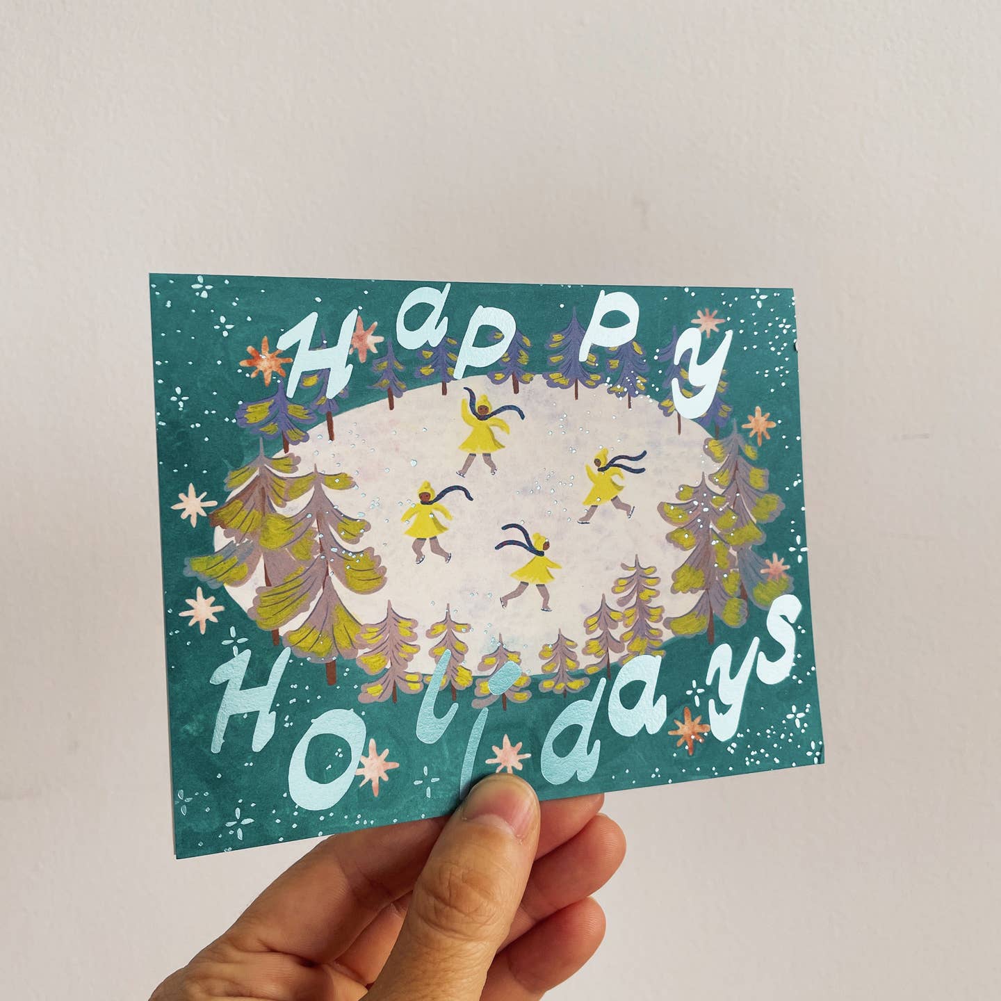 Holiday Ice Skaters Greeting Card