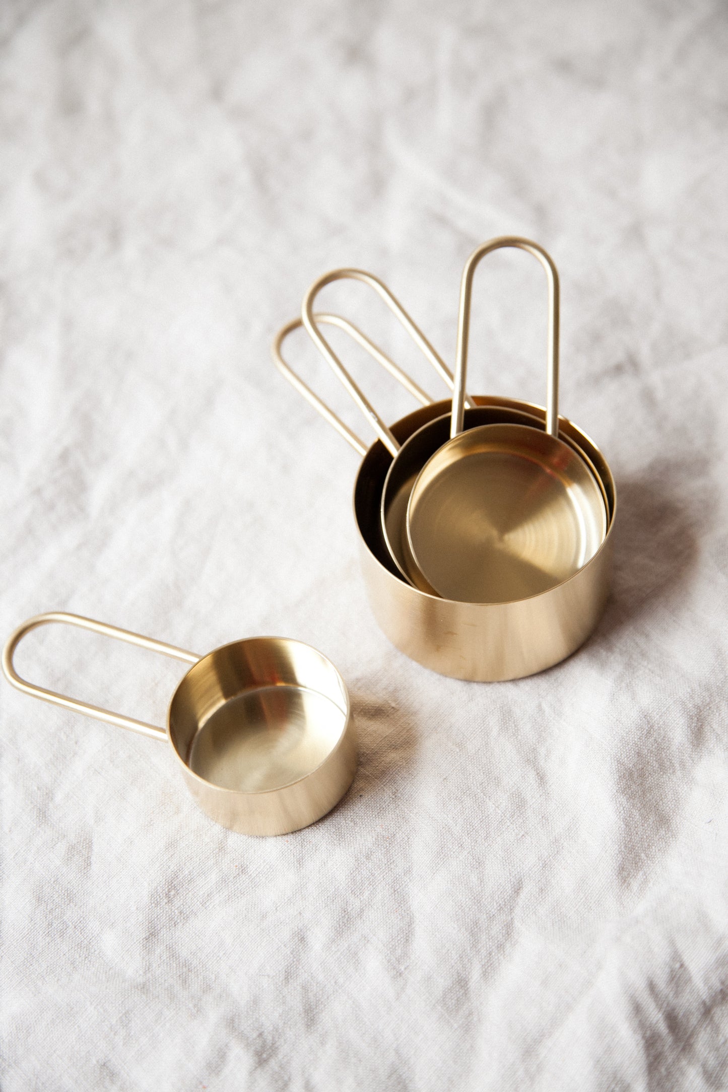 Edwin Measuring Cups  Brass with Green Handle